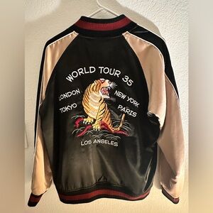 Stussy Black and Gold Satin Jacket Label
SIZE SMALL (correction)